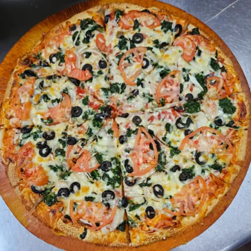 Greek-Style Pizza - Our signature Greek-style pizza with delicious sauce and a perfectly crispy crust — a Medway favorite!